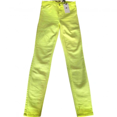 Pre-owned 7 For All Mankind Slim Jeans In Yellow