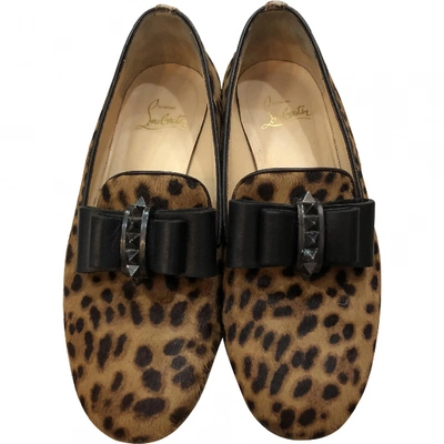 Pre-owned Christian Louboutin Pony-style Calfskin Flats In Brown