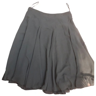 Pre-owned Dkny Silk Mid-length Skirt In Black
