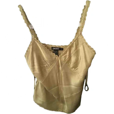 Pre-owned Dkny Silk Blouse In Gold