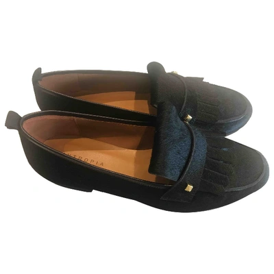 Pre-owned Hoss Intropia Pony-style Calfskin Flats In Black