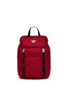 Prada Logo Plaque Backpack In Red