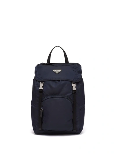 Prada Logo-embellished Leather And Recycled-nylon Backpack In Blue