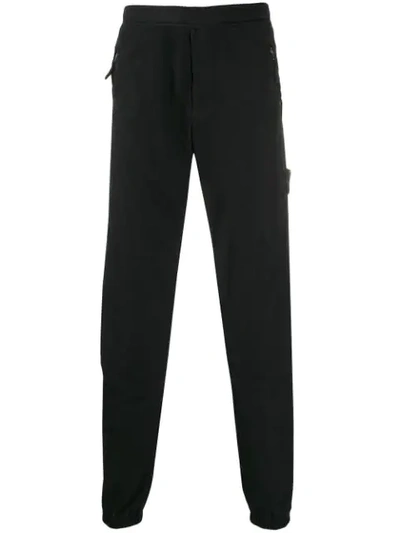 Stone Island Logo Patch Trousers In Black