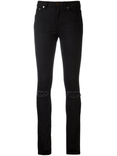 Saint Laurent Distressed Skinny Jeans In Black