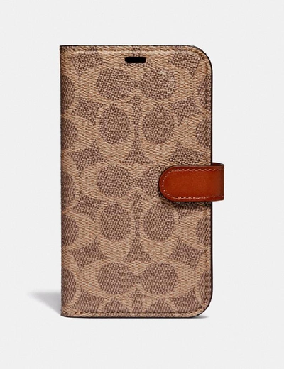 Coach Iphone X/xs Folio In Signature Canvas In Tan