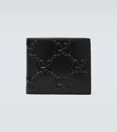 Gucci Gg Embossed Wallet In Black