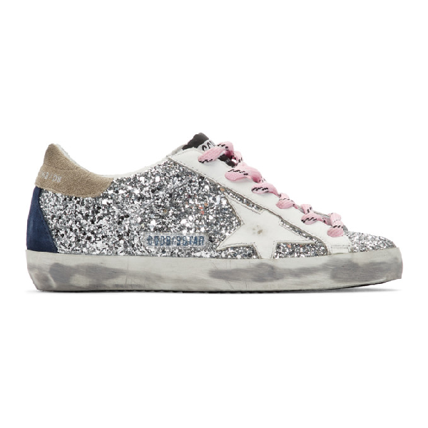 white and silver golden goose sneakers