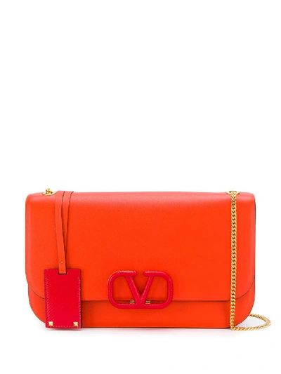 Valentino Garavani Vlock Shoulder Bag In Orange
