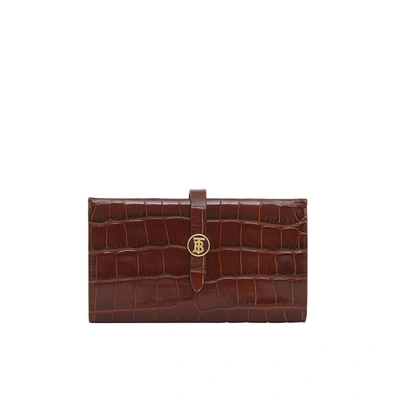 Burberry Monogram Motif Embossed Leather Folding Wallet In Tan