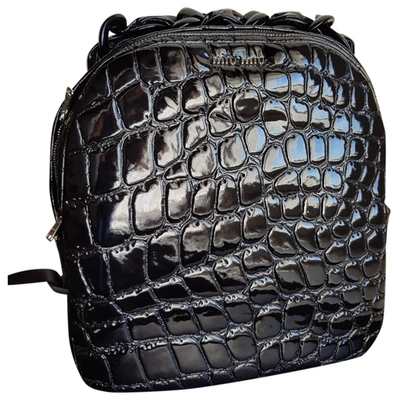 Pre-owned Miu Miu Patent Leather Backpack In Black