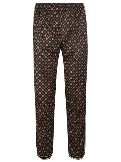 Gucci All-over Logo Printed Track Pants In Black