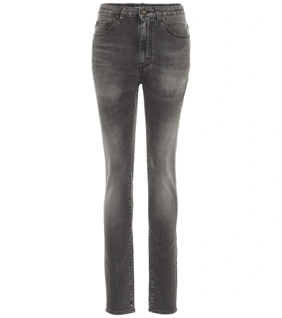 Saint Laurent Skinny Jeans With Frayed Hems In Black