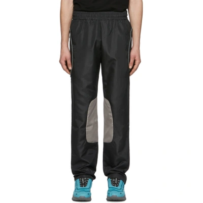 All In Black And Brown Xp Track Pants In Black/brown