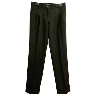 Pre-owned Dolce & Gabbana Wool Straight Trousers In Black