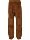 Undercover Shearling Detail Trousers In Brown