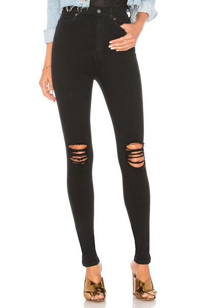 Dr. Denim Lexy Mid Rise Skinny. - In Black Ripped Knees