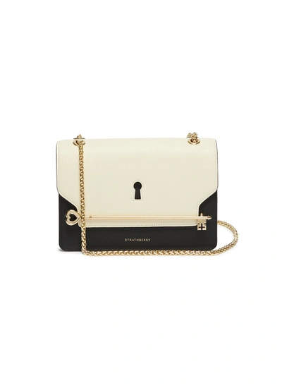 Strathberry East/west Keyhole Leather Crossbody Bag In Black / White