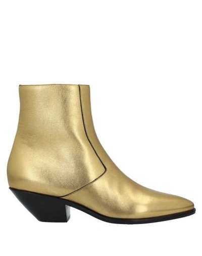 Saint Laurent Ankle Boots In Gold