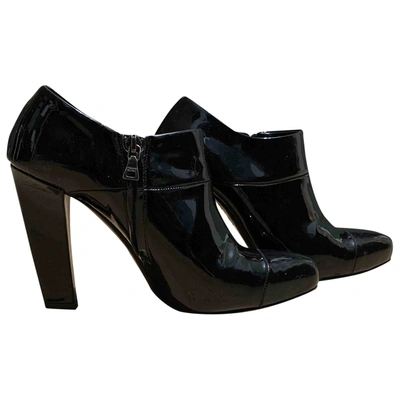 Pre-owned Prada Patent Leather Ankle Boots In Black