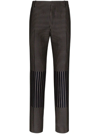 Alexander Mcqueen Striped Slim-fit Trousers In Black