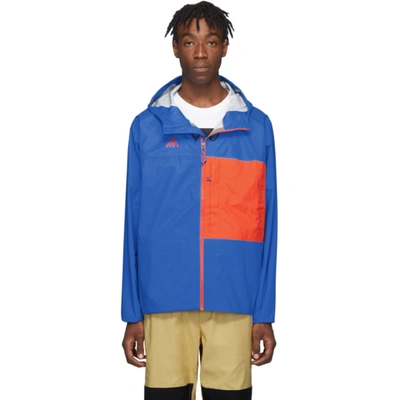 Nike Acg Packable Rain Jacket In Lt Photo Blue/habanero Red | ModeSens