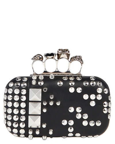 Alexander Mcqueen Studded Leather Four Ring Clutch In Black