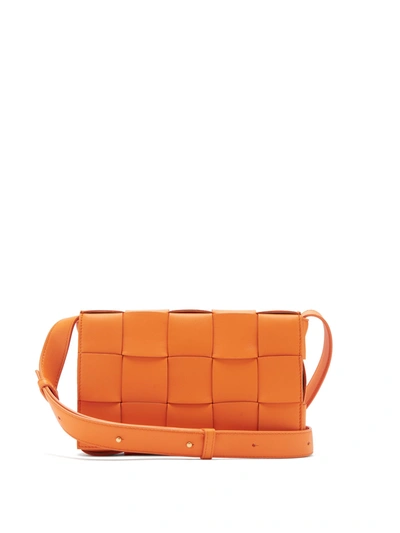 Bottega Veneta Cassette Small Intrecciato Leather Cross-body Bag In Orange
