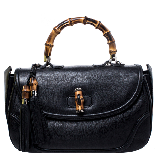 gucci bamboo tassel clutch