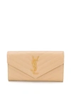 Saint Laurent Monogramme Logo Leather Flap Wallet In Latte
