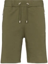 Balmain Embossed Logo Cotton Track Shorts In Green