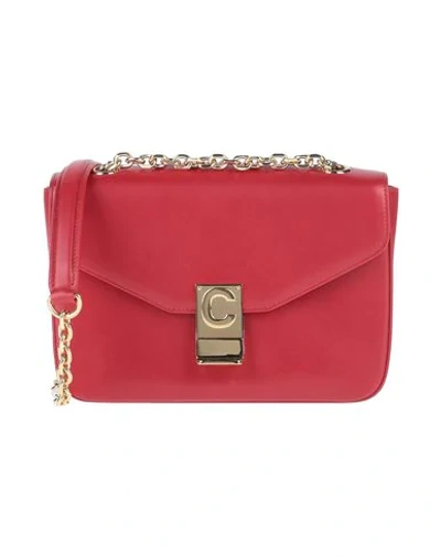 Celine Handbags In Red