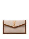 Saint Laurent Uptown Monogram Clutch In Neutrals