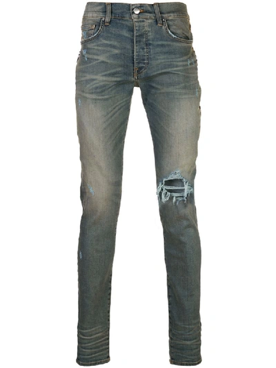 Amiri Distressed Skinny Jeans In Blue