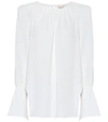 Khaite Kirsty Wide-cuff Cutout Satin Blouse In White