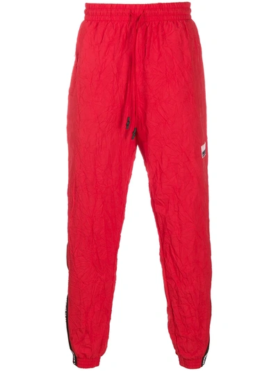 Puma Logo-tape Crinkle Track Trousers In Red