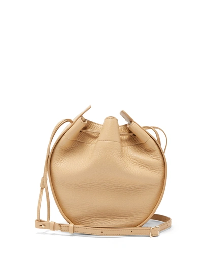 The Row Drawstring-pouch Leather Cross-body Bag In Cream Silk