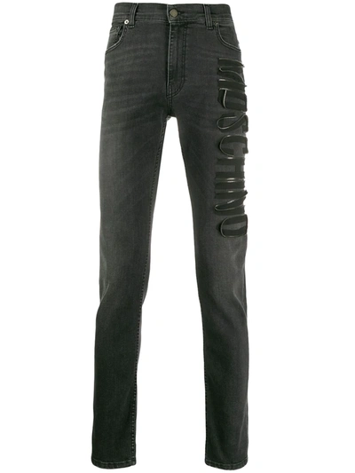 Moschino Slim-fit Logo Jeans In Grey