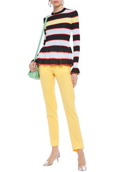 Msgm Ruffle-trimmed Striped Ribbed-knit Peplum Sweater In Black