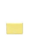 Ganni Textured Leather Clutch In Lemon In Yellow