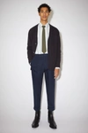 Acne Studios Cropped Tapered-fit Trousers Navy Blue