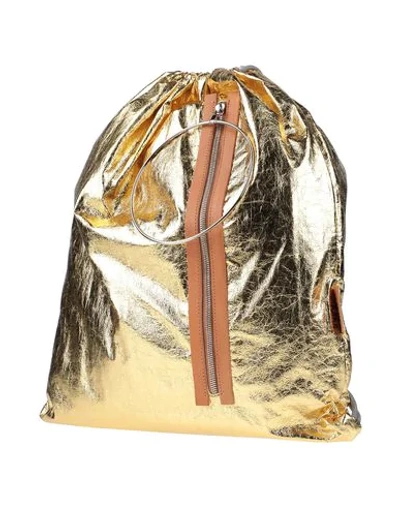 Mm6 Maison Margiela Backpacks In Gold