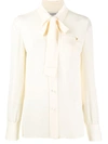 Valentino Pussy-bow V-gold Plaque Silk Blouse In Cream