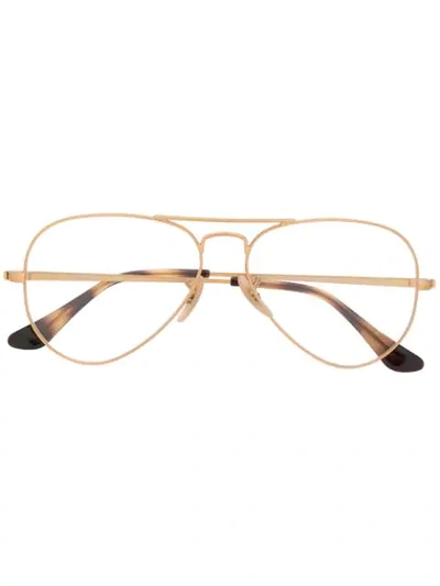 Ray Ban Oversized Round Frame Glasses In Gold