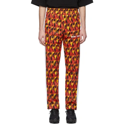 Palm Angels Flame Print Track Trousers In Red