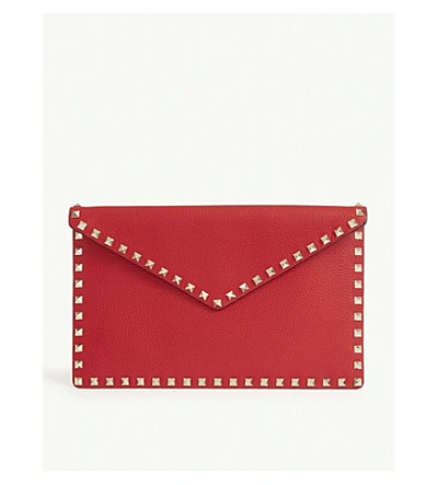 Valentino Garavani Rockstud Envelope Leather Clutch In Rouge Pur
