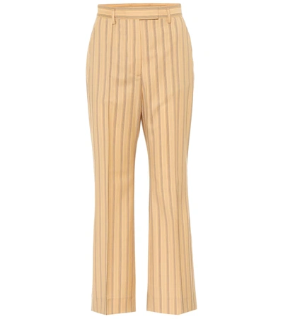 Acne Studios Cropped Pinstriped Grain De Poudre Wool Flared Pants In Yellow