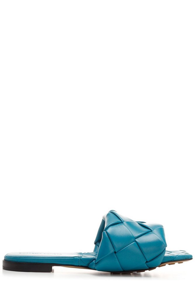 Bottega Veneta The Lido Intrecciato Leather Slides In Blue