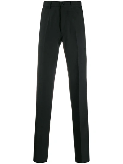 Random Identities Rear Panelled-print Trousers In Black
