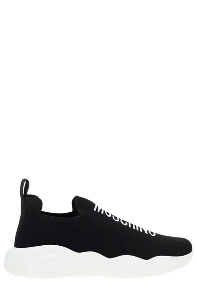 Moschino Logo Print Slip-on Trainers In Black,white